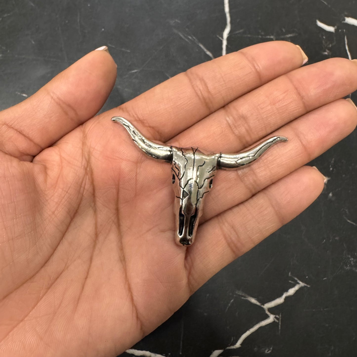 BROCHE TORO